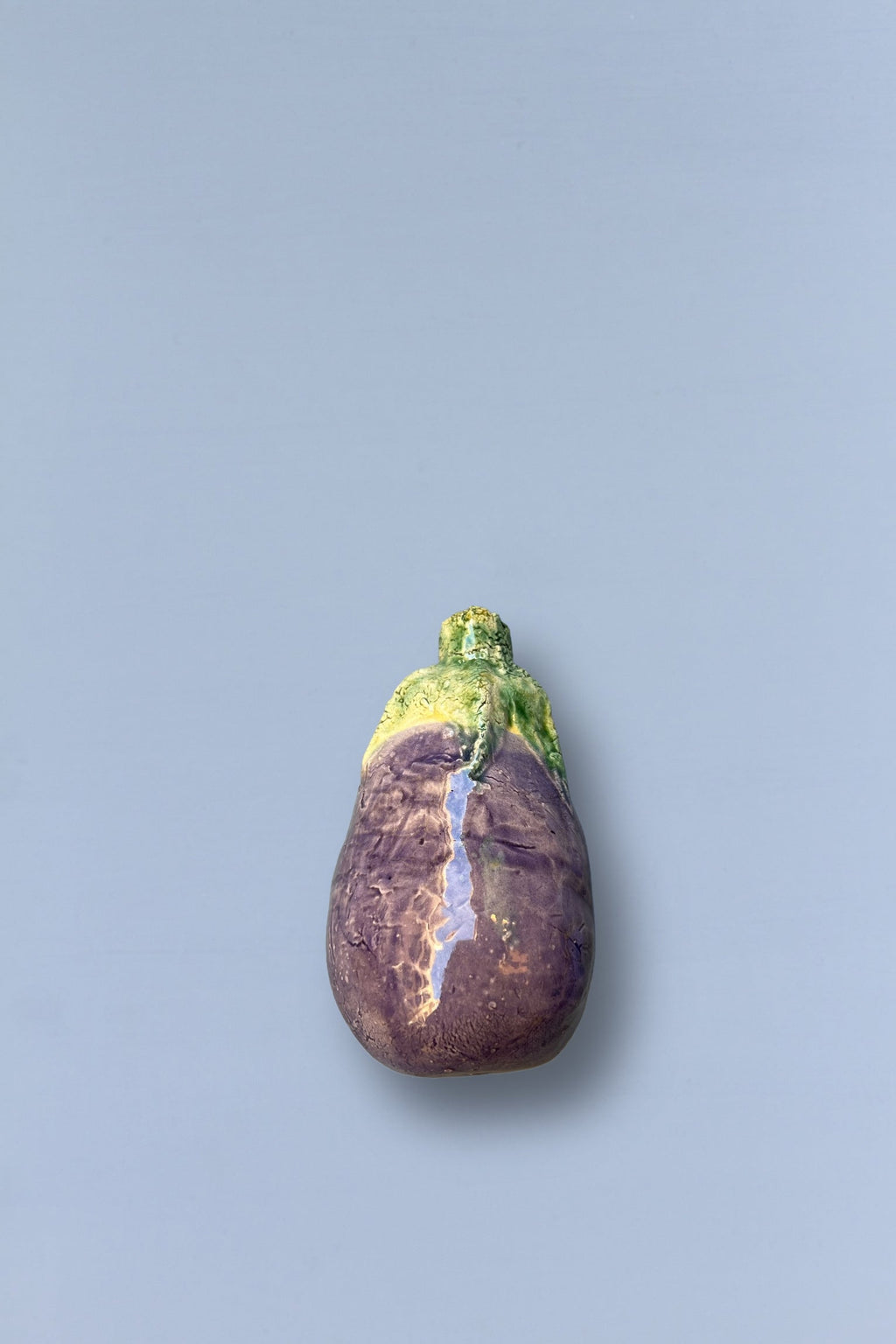 Berenjena réplica de cerámica esmaltada